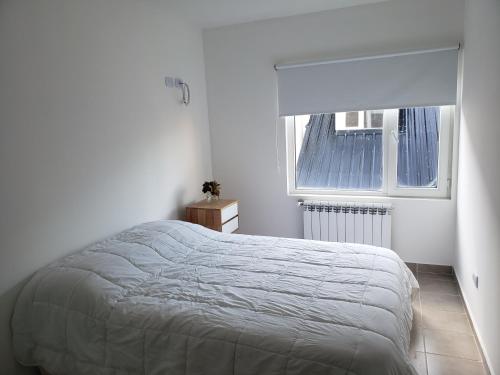 Llit o llits en una habitació de Apartment RG
