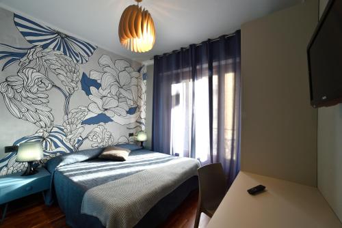 Una cama o camas en una habitación de Hotel Bristol