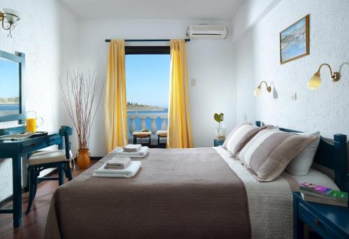 Postel nebo postele na pokoji v ubytování Victoria Hotel