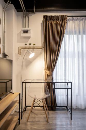 Postel nebo postele na pokoji v ubytování My Loft Hotel SHA