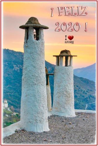 a poster for a movie with two lighthouses at Casa Mamica Rosario in Yegen