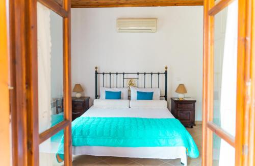 Ένα ή περισσότερα κρεβάτια σε δωμάτιο στο SEA ZOE, Summer House