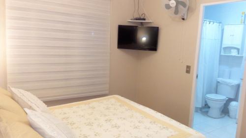 Кровать или кровати в номере Alojamiento Los Nogales