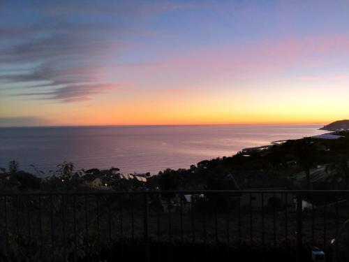 a view from a balcony overlooking the ocean at La Casa Di Sissi B&B in Sanremo