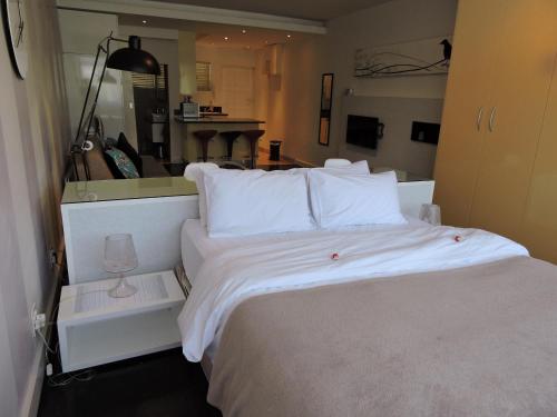 מיטה או מיטות בחדר ב-Apartment Mouille Point 27