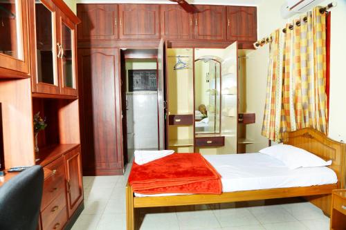 מיטה או מיטות בחדר ב-ZuriEL Suite GUEST HOUSE