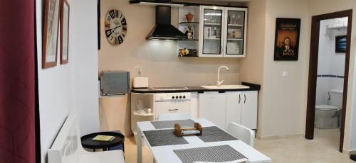 Una cocina o zona de cocina en Apartamentos Porvera Centro