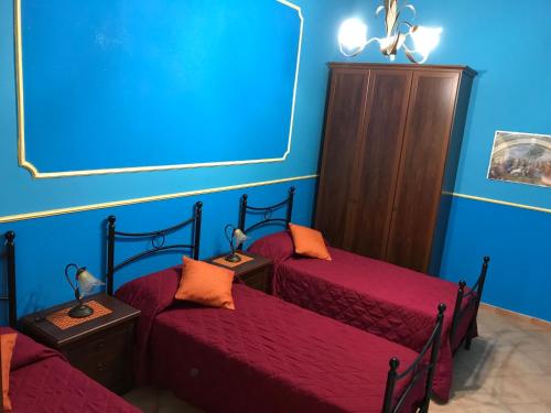 Кровать или кровати в номере Villafiorita
