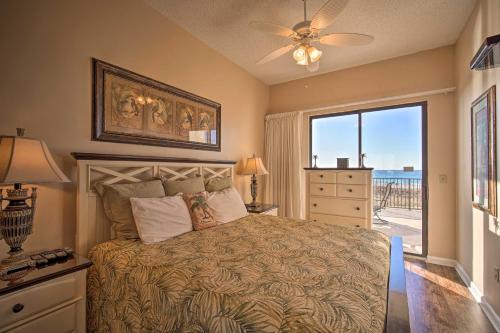 a bedroom with a bed with a view of the ocean at Gulf Coast Luxury Getaway on Orange Beach with Views in Orange Beach