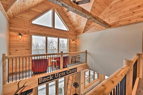 a log home with a large vaulted ceiling at Rustic 3-Story Pittsburg Cabin with Lake and Mtn Views in Pittsburg