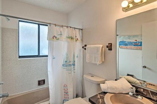 a bathroom with a shower and a toilet and a sink at Central Venice Apartment with Balcony, Walk to Beach in Venice