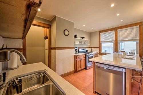 a kitchen with a sink and a counter top at Pet-Friendly Sheboygan Home, 1 Mi to Lake Michigan in Sheboygan