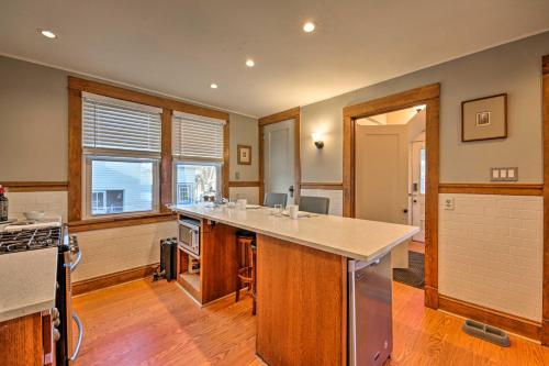 a kitchen with an island in the middle of it at Pet-Friendly Sheboygan Home, 1 Mi to Lake Michigan in Sheboygan