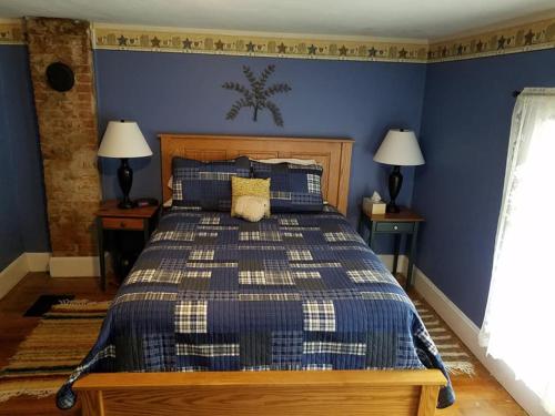 Postel nebo postele na pokoji v ubytování Rainbow Ridge Farms