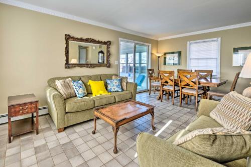a living room with a couch and a table at Oceanside Beach House in Pvt Beach Community! in Mantoloking