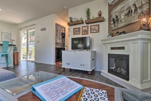 
A television and/or entertainment center at Prescott Cottage with Furnished Deck, Patio, and BBQ!
