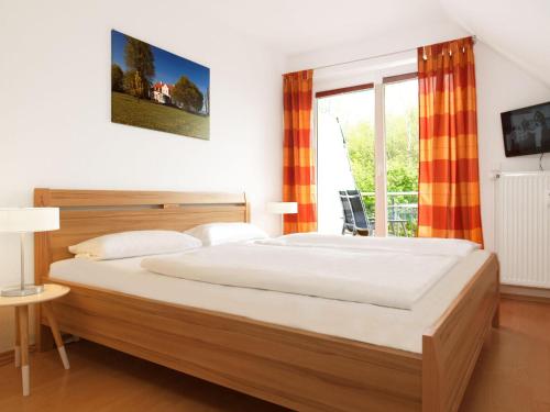 Voodi või voodid majutusasutuse Ostsee Residenz Meeresblick Meeresrauschen toas