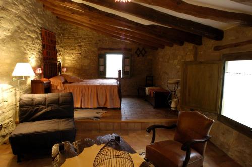 Postel nebo postele na pokoji v ubytování Casa Tomàs