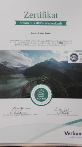 a page of a website with a picture of a mountain at Boutique Hotel Oase in Bad Ischl