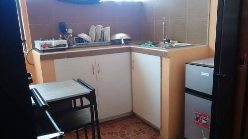 Kuchyň nebo kuchyňský kout v ubytování Mary Chiang Baguio Transient House