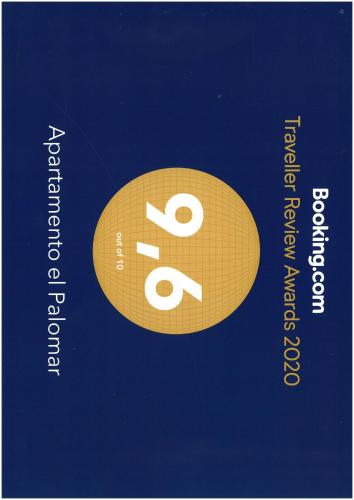 a book cover with a yellow and white symbol at Apartamento el Palomar in Ayllón