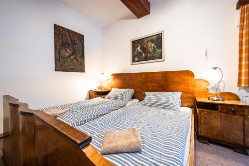 Ein Bett oder Betten in einem Zimmer der Unterkunft Hájenka Harrachov