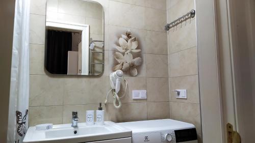 Vonios kambarys apgyvendinimo įstaigoje Апартаменти Софія