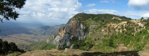 a mountain with trees on top of it at Mambo View Point in Ndungu