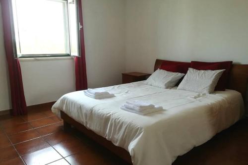 En eller flere senge i et værelse på Casa Mareco