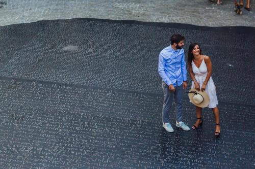 a man and a woman standing on a street at Mercure Figeac Viguier du Roy in Figeac