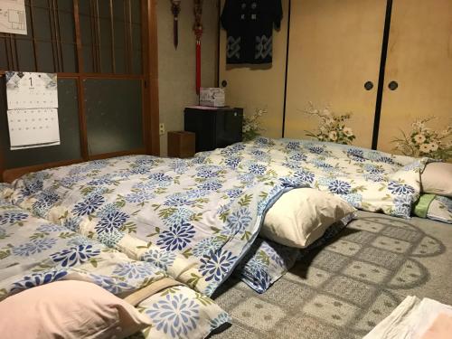מיטה או מיטות בחדר ב-Guest House Salt Beach