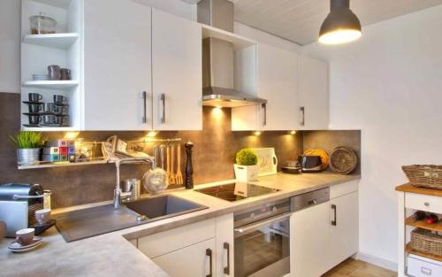 Dapur atau dapur kecil di Ferienhaus Nest
