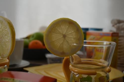 a lime is sitting on top of a glass at Het Houten Paard in Ypres