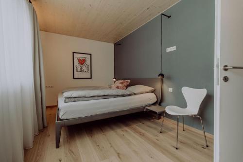 Una cama o camas en una habitación de vier mäderlhaus