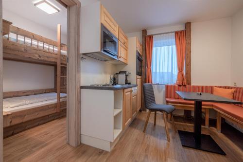Una cocina o zona de cocina en Hotel Samerhof - Skidepot inklusive