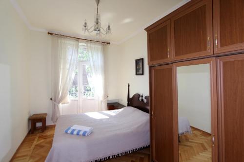 Top Apartments - Yerevan Centre tesisinde bir odada yatak veya yataklar