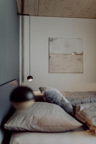 Una cama o camas en una habitación de vier mäderlhaus