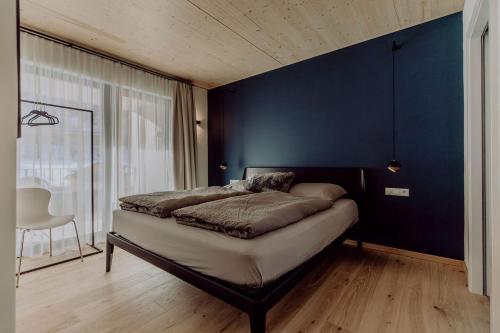 Una cama o camas en una habitación de vier mäderlhaus
