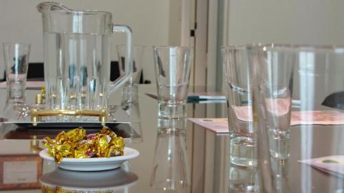 a blender sitting on a table with a bowl of food at Altos De Balcarce Hotel in Salta