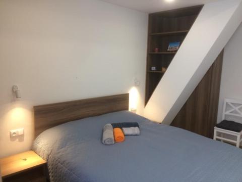 Postel nebo postele na pokoji v ubytování Tea Apartment