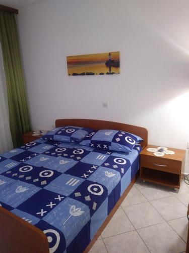 Postel nebo postele na pokoji v ubytování Apartments Soljacic