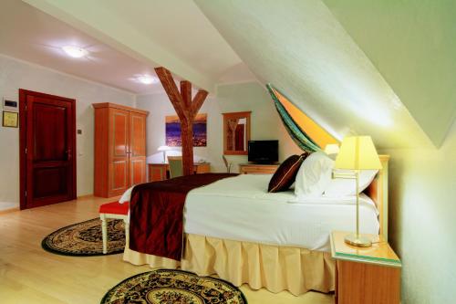Ένα ή περισσότερα κρεβάτια σε δωμάτιο στο Hotel The Council
