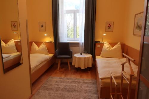 Cama o camas de una habitación en Kur- und Gästehaus Villa Anna