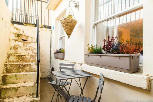 Seafront Apartment with Garden photo 26