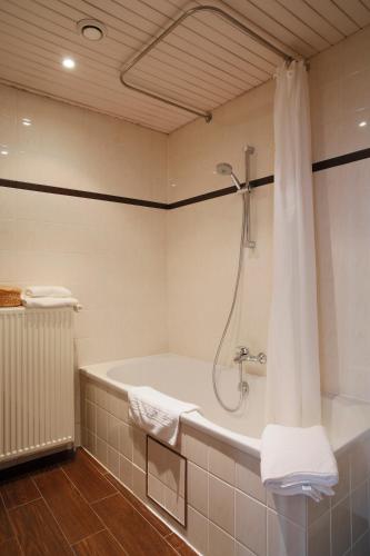 Koupelna v ubytování Hotel Grupello