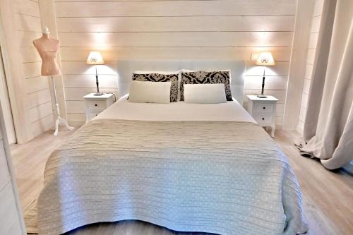 Ένα ή περισσότερα κρεβάτια σε δωμάτιο στο Chalet cosy de Plage entre Biarritz et Hossegor