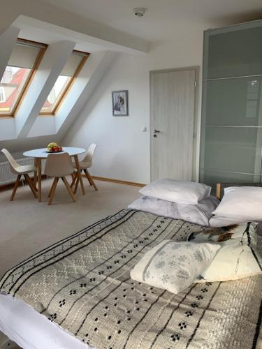 Postel nebo postele na pokoji v ubytování Residence Sarka