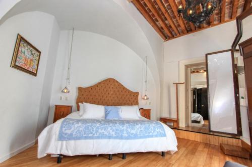 Postel nebo postele na pokoji v ubytování Hotel Mansion Von Humboldt