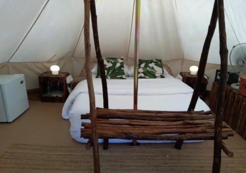 En eller flere senger på et rom på Ella Retreat Glamping Bell Tent For Nature Lovers