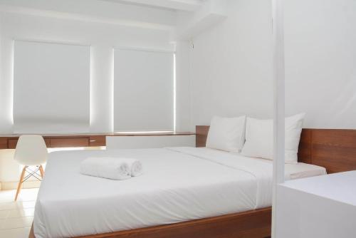 Postel nebo postele na pokoji v ubytování Town View Apartment Studio Patraland Urbano By Travelio